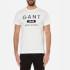 Men's 'Athletics' T-shirt from GANT. Constructed from soft cotton, the tee comprises a crew neck, short sleeves and a GANT 1949 logo print to the chest. Complete with a straight hem and contrasting stitching at the reverse neck and shoulders.  100% Cotton Model is 188cm/6'2  and wears a size M.